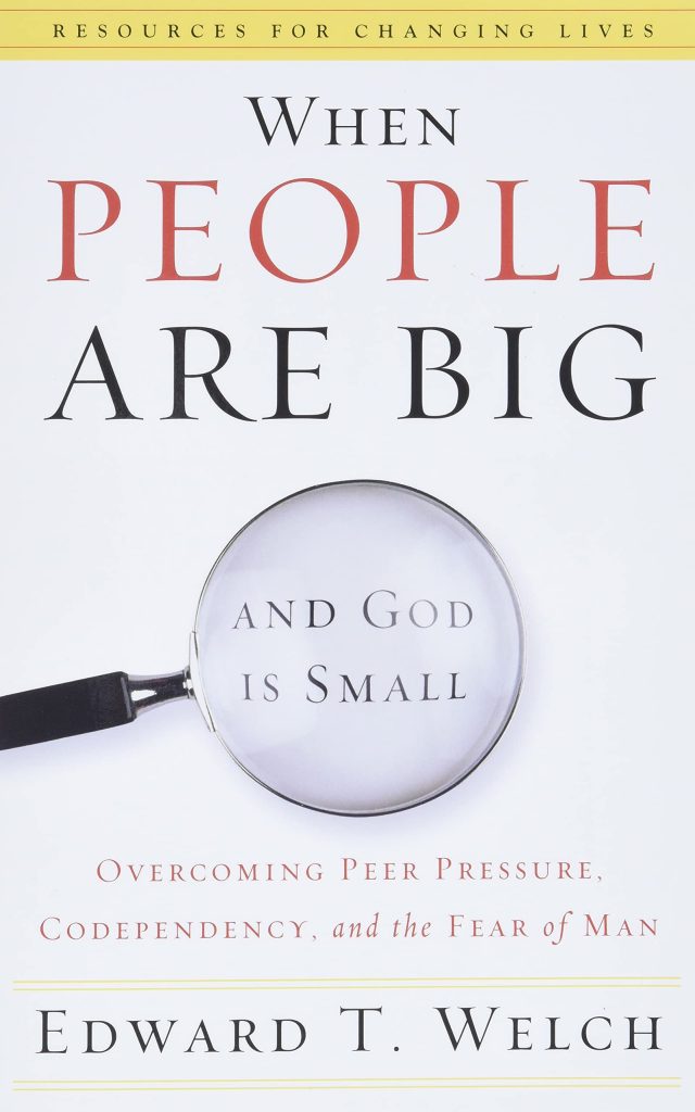 Book cover for "When People are Big and God is Small" by Edward T. Welch. It shows the words "and God is Small" inside of a magnifying glass.