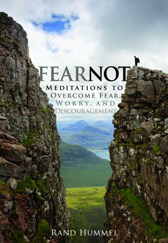 Cover for "Fear Not: Meditations to overcome Fear, Worry, and Discouragement" by Rand Hummel. It shows a man on a cliff on the right side with a large ravine in the middle of two large green mountains.