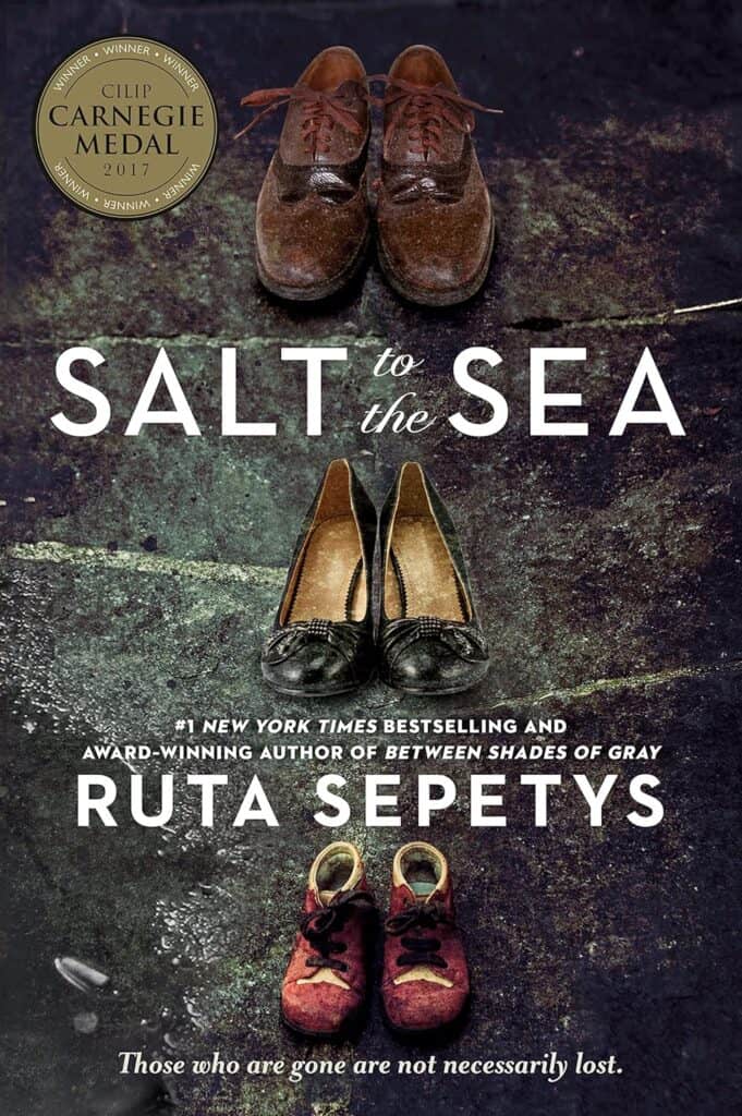 Book cover of "Salt To The Sea" by Ruta Sepetys. It shows a man's, woman's, and child's pairs of shoes on a wet paved background.