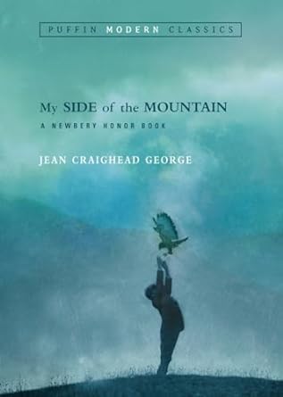 Book Cover for "My Side of the Mountain" by Jean Craighead George. It shows a beautiful blue mountain covered in mist in the background. In the foreground is a silhouette of a boy catching a falcon.