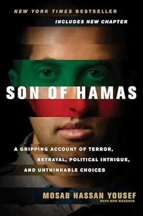 book cover for "Son of Hamas" by Mosab Hassan Yousef. It shows His face covered by the colors of the Palestinian Flag